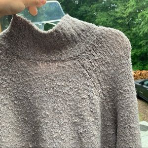 Oversized sweater with extra long sleeves